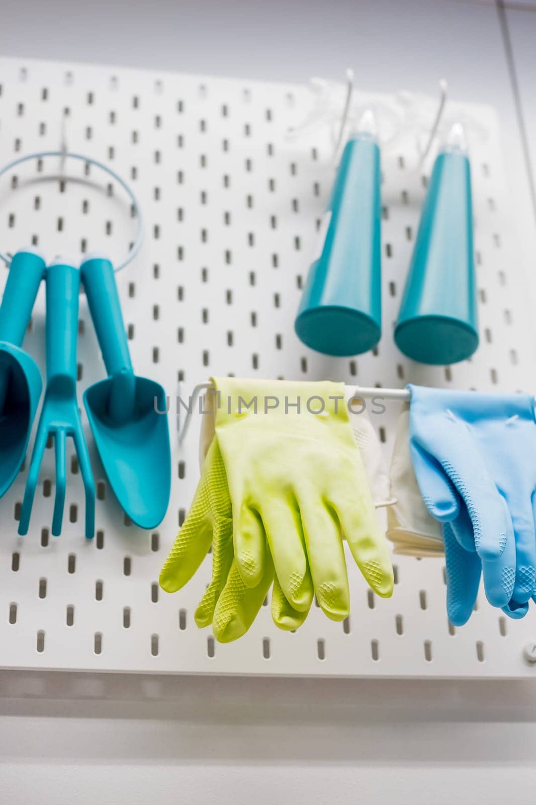 Shovel,rake and gloves isolated on white.