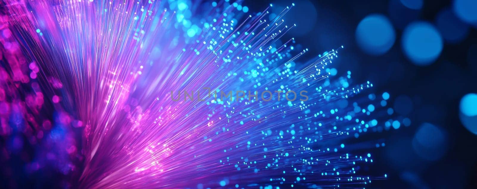 Colorful fiber optic lights with bokeh, abstract technology concept.