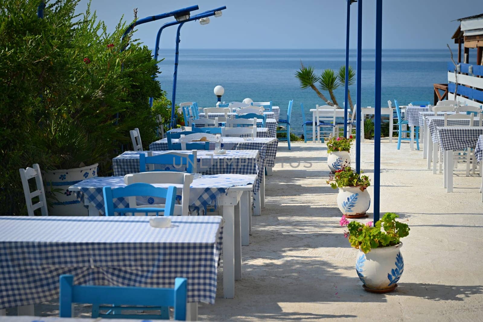 Classic Greek tavern. Corfu Island - Greece. Concept for summer holidays and vacation. 