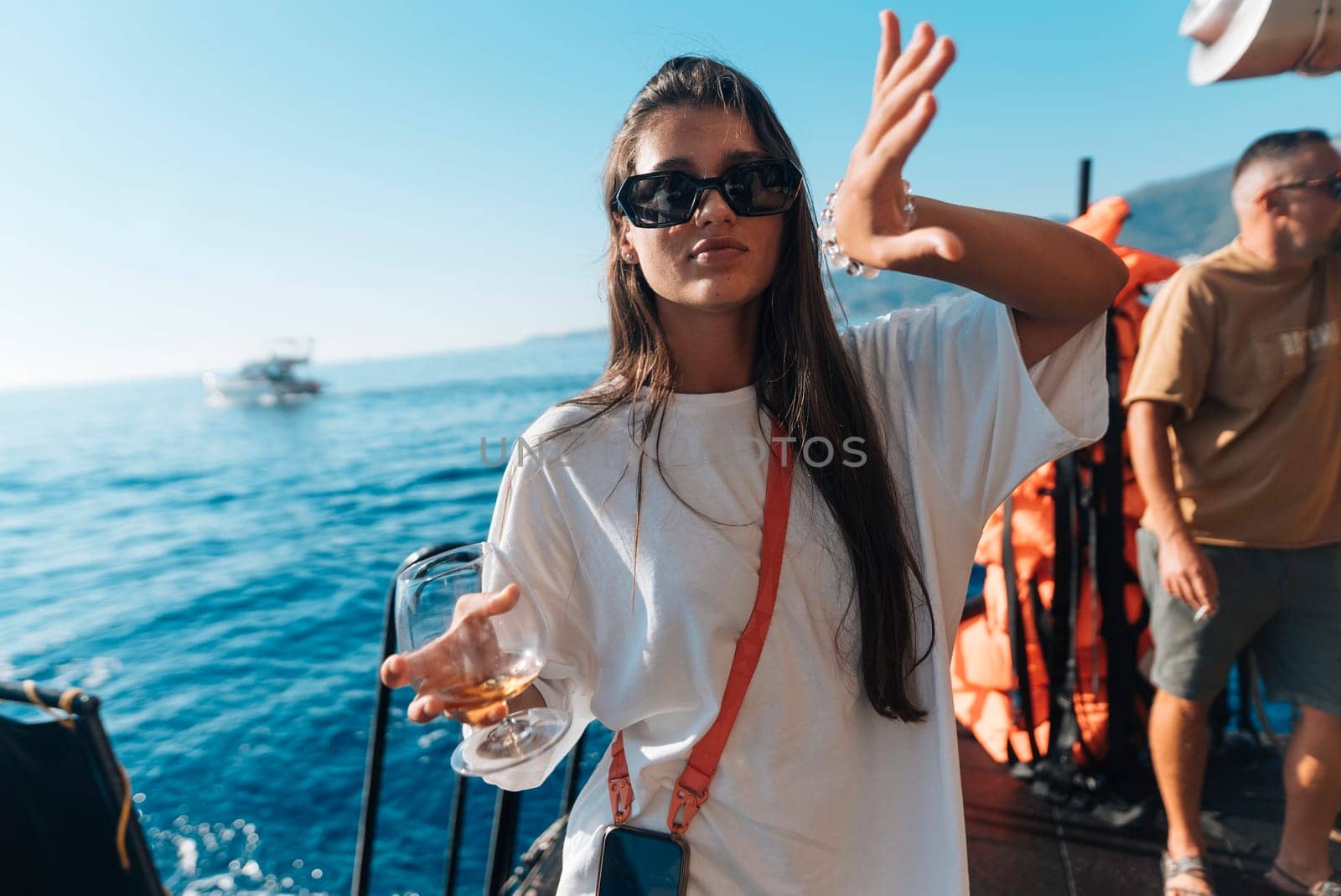 A joyful moment was captured on an exciting boat trip, showcasing deep friendship under the warm sun