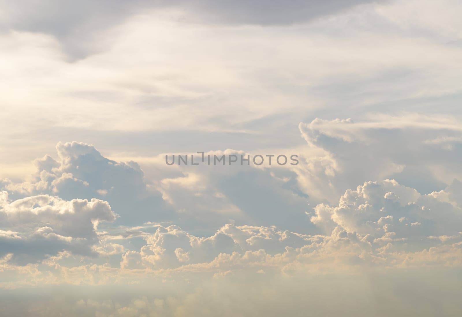 The sky is being covered with amazing clouds. Beautiful clouds like a heaven sky toward the light, Concept idea of Imaginative clouds nature, Nature abstract composition for background wallpaper and textures, Space for text, Selective focus.