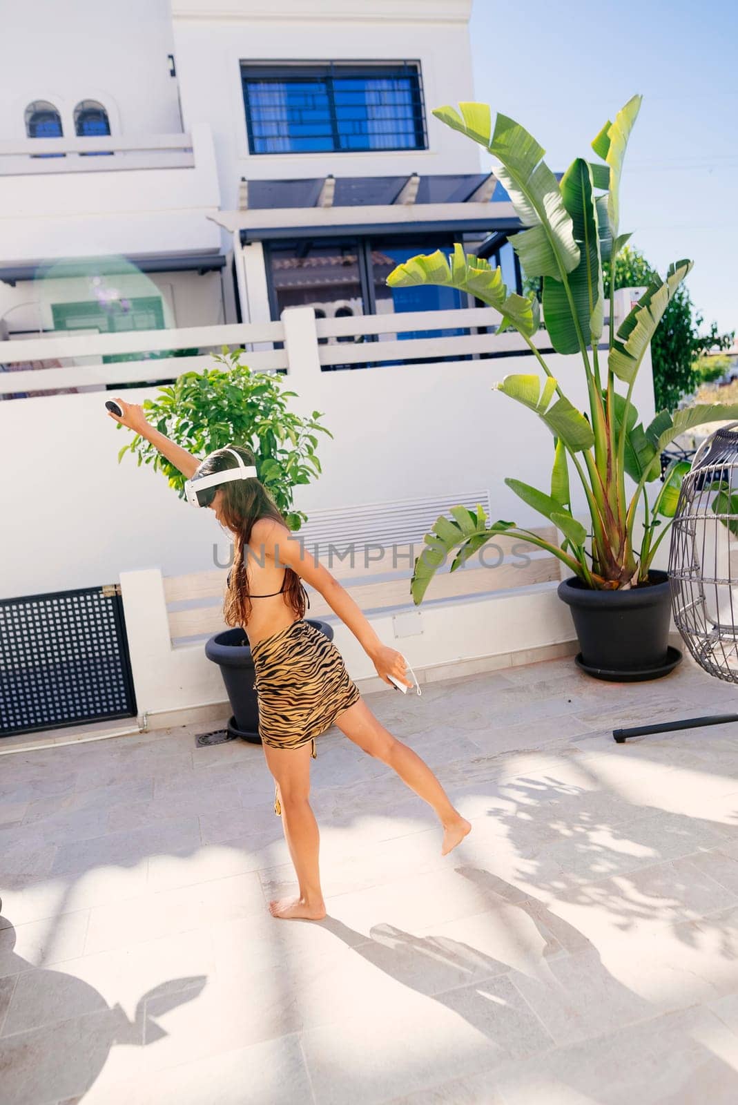 A joyful and vibrant moment beautifully captured outdoors, showcasing carefree summer vibes and warmth all around