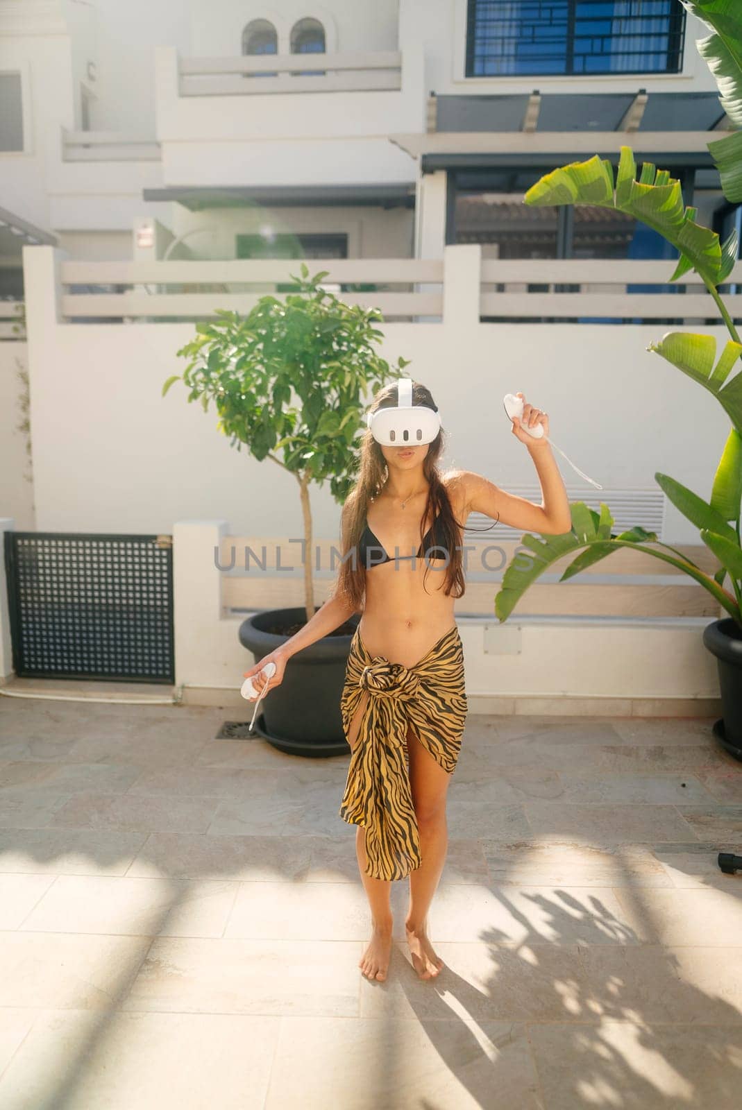 A lively scene of a person in a unique mask and colorful outfit, enjoying a bright, sunny outdoor setting