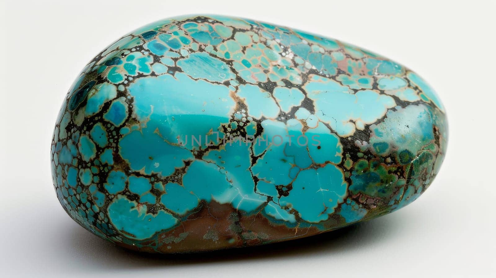 A detailed closeup of a polished turquoise gemstone displaying its distinctive and vibrant patterns against a white background. ideal for natureinspired designs, jewelry showcases, mineral collections, and educational materials about gemstones.