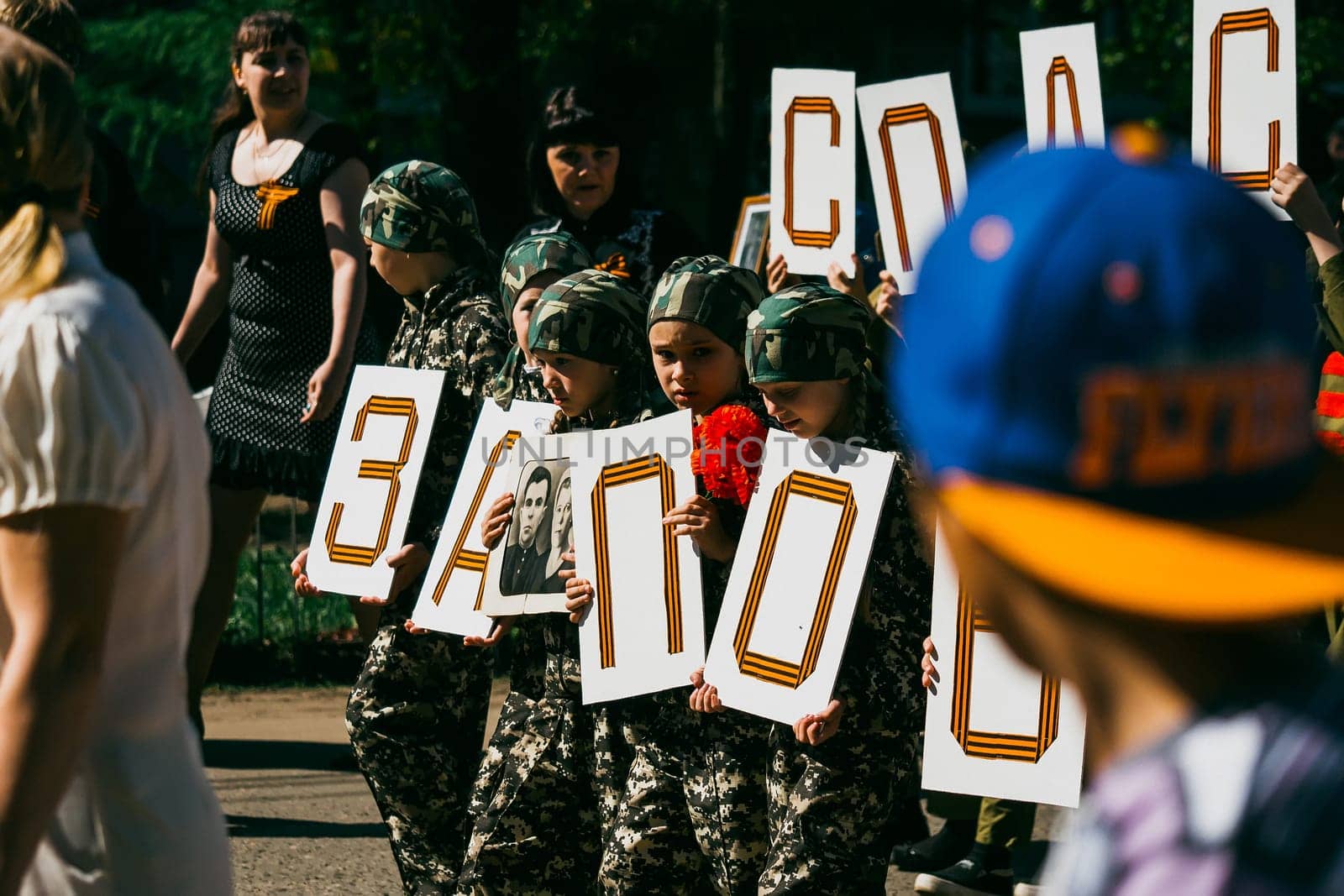 VICHUGA, RUSSIA - MAY 9, 2016: The children in uniform at the parade in honor of Victory in World War II. Immortal Regiment, Russia, may 9