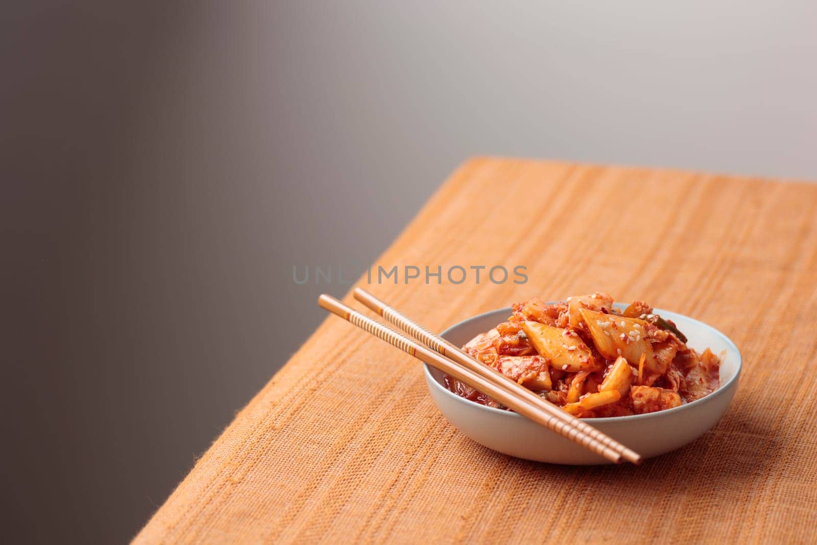 Kimchi, Kimchee in the Bowl, Red Spicy Kim Chi, Hot Fermented Napa Cabbage, Traditional Jimchi, Korean cuisine, horizontal banner with a copy space