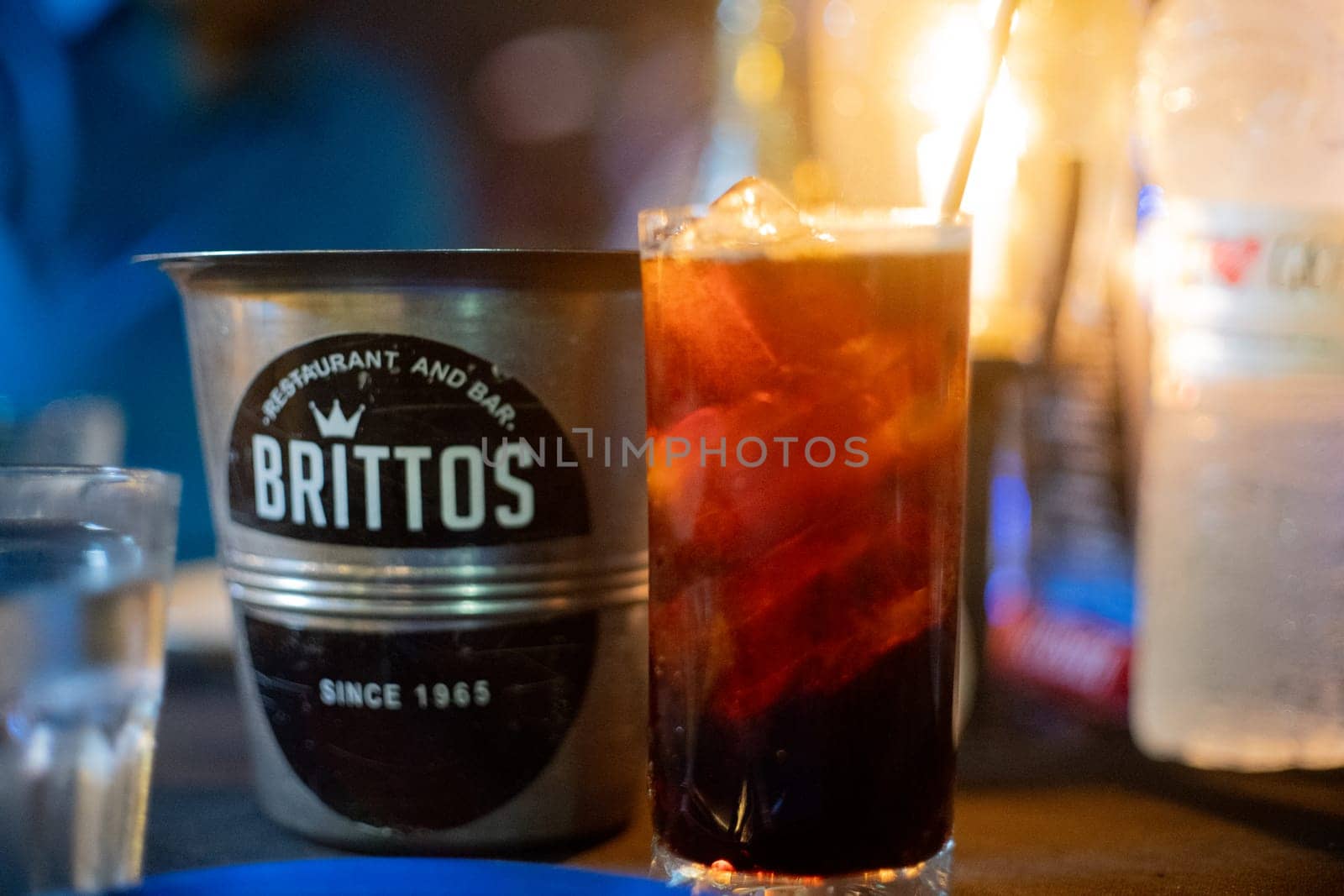 Goa, India - 16th Aug 2024: Macro shot showing ice bucket of famous bar shack Brittos on Baga beach a popular spot for drinks, seafood, food, music, karaoke and more