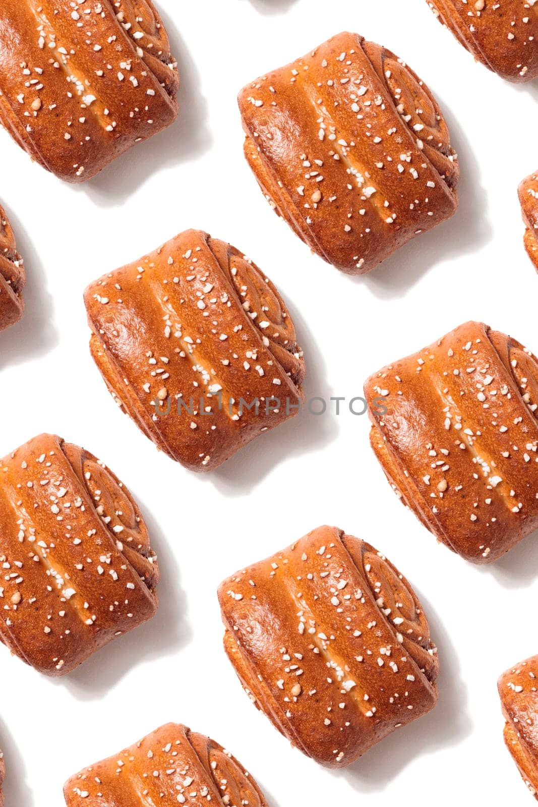 Korvapuusti, traditional finnish cinnamon and cardamom rolls, fresh baked buns in Finland and Sweden, pattern, background