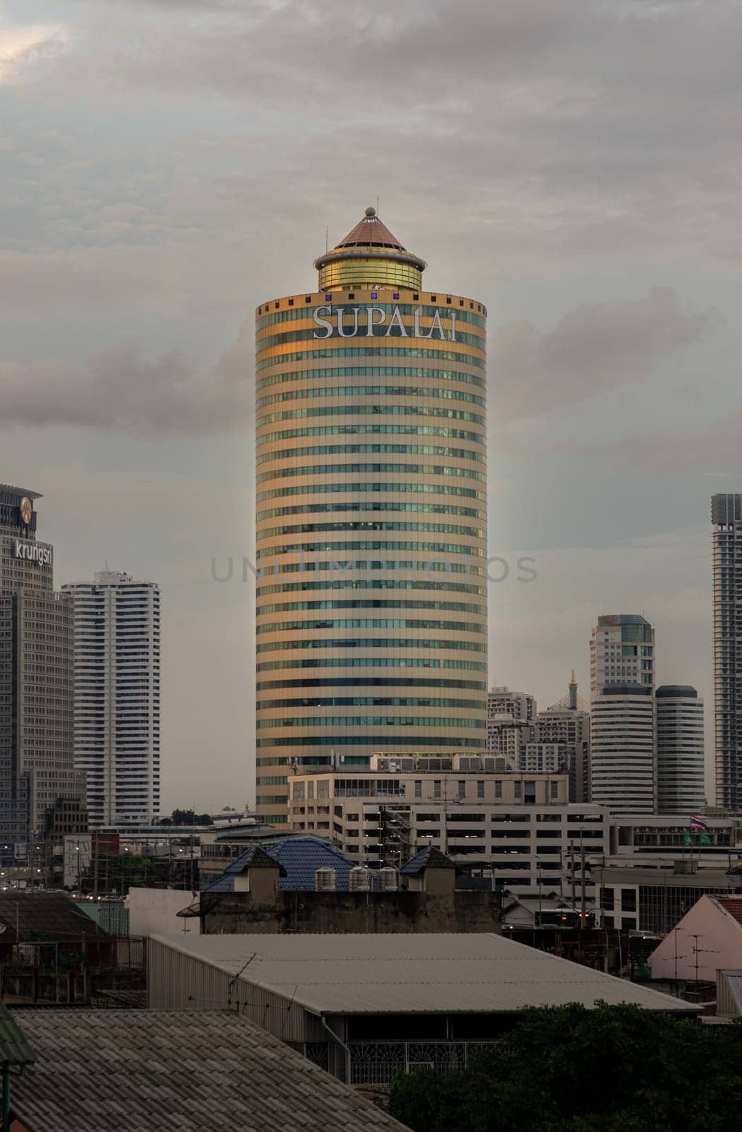 Bangkok, Thailand - 04 Oct, 2024 - Architecture exterior of Supalai Grand Tower and Modern buildings in the city of Bangkok before Sunset. Space for text, Selective focus.