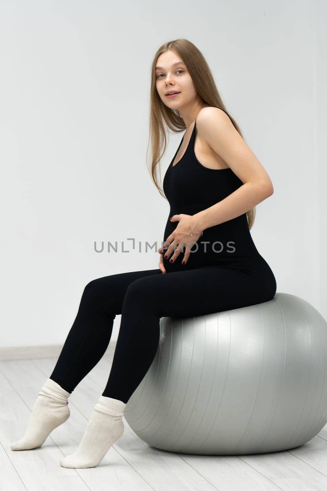 pregnant exercise ball workout fit healthy pregnancy care fitness woman female maternity