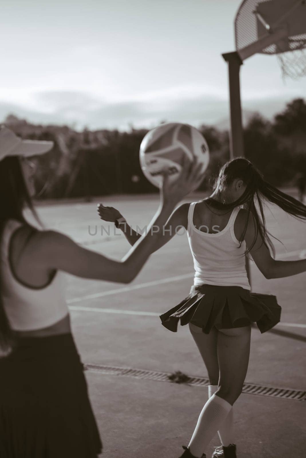 Dynamic moment capturing enthusiastic cheerleaders who are showcasing their impressive skills during practice sessions