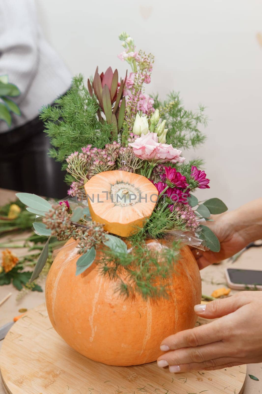Creating a floral composition in a pumpkin. Making decor with your own hands