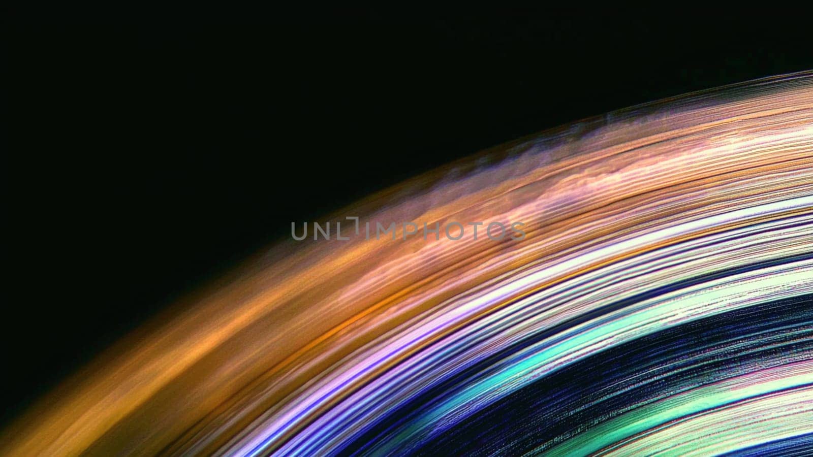 Light trails creating a colorful abstract background with a sense of movement and speed, suitable for technology or design projects