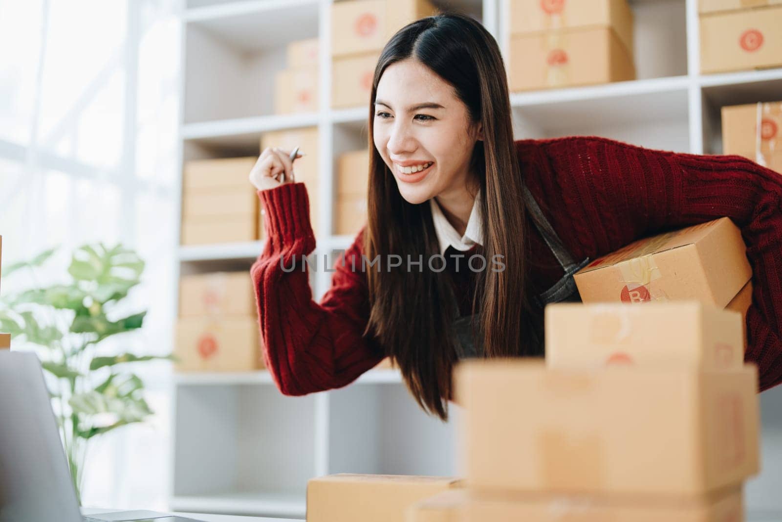 Online delivery, female small business owners are ecstatic when they see unexpected sales and customer orders in their business planning and marketing.