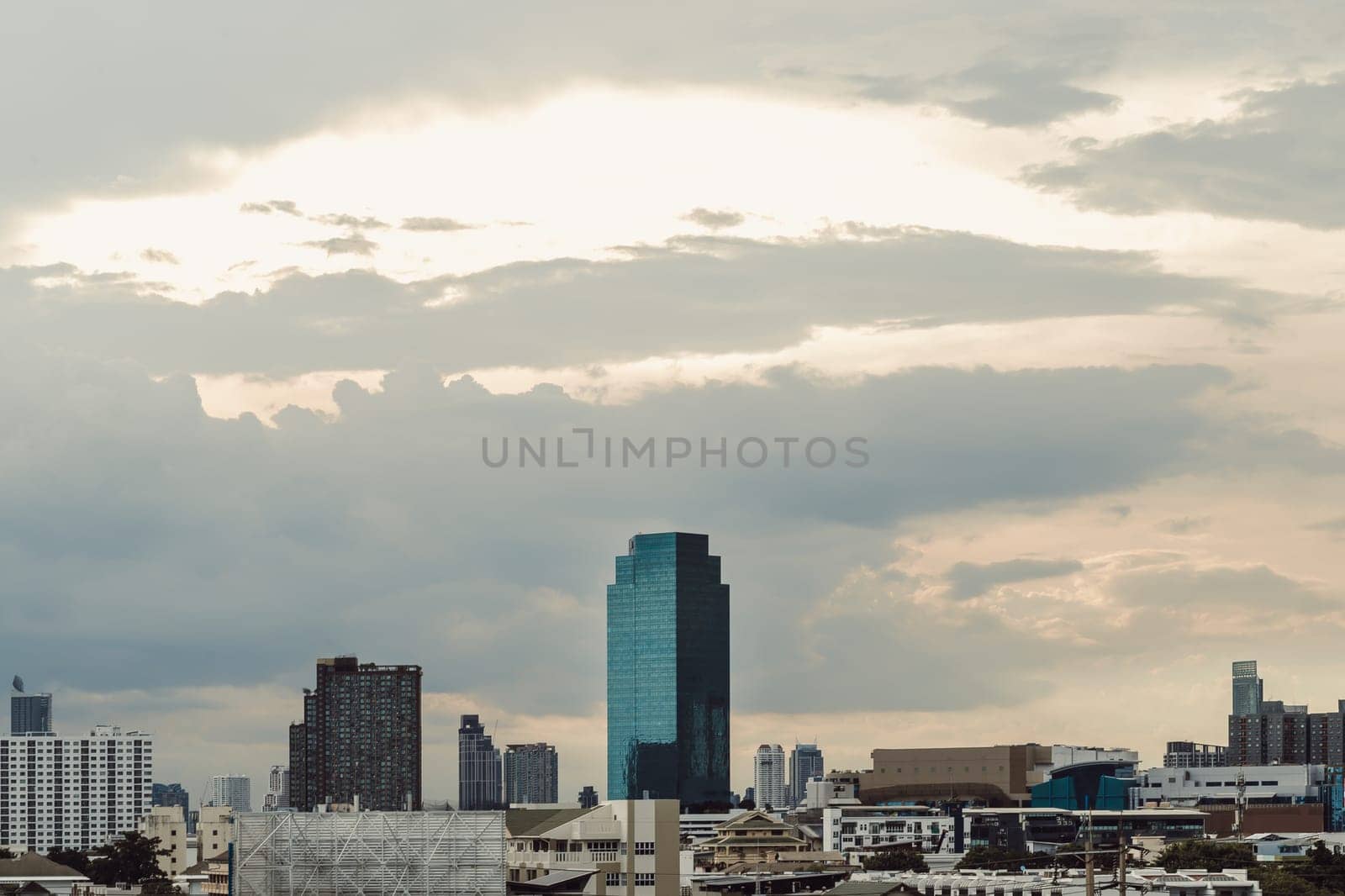 Bangkok, Thailand - 14 Aug, 2024 - Architecture exterior of Modern high-rise buildings of Dramatic sky in the city of Bangkok. Picturesque view of skyscrapers before Sunset, Space for text, Selective focus.