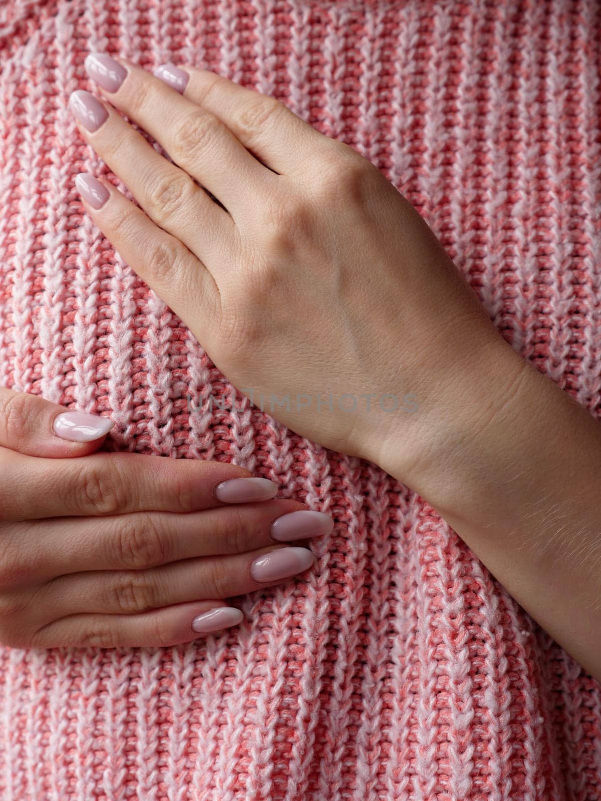 Pink October Breast Cancer Awareness month, woman hand with pink Ribbon in hospital for support people life and illness. Vertical