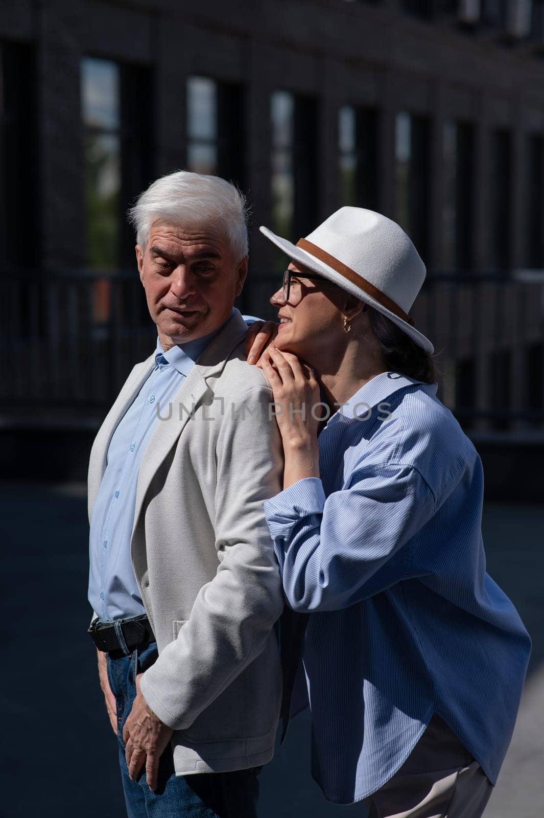 Mature couple walking around the city and sightseeing. by mrwed54