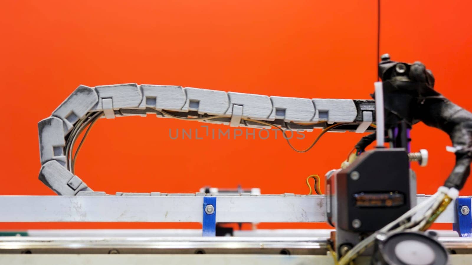 An iron robot working in a factory. Media.Development of equipment that copes without people with heavy materials. High quality 4k footage