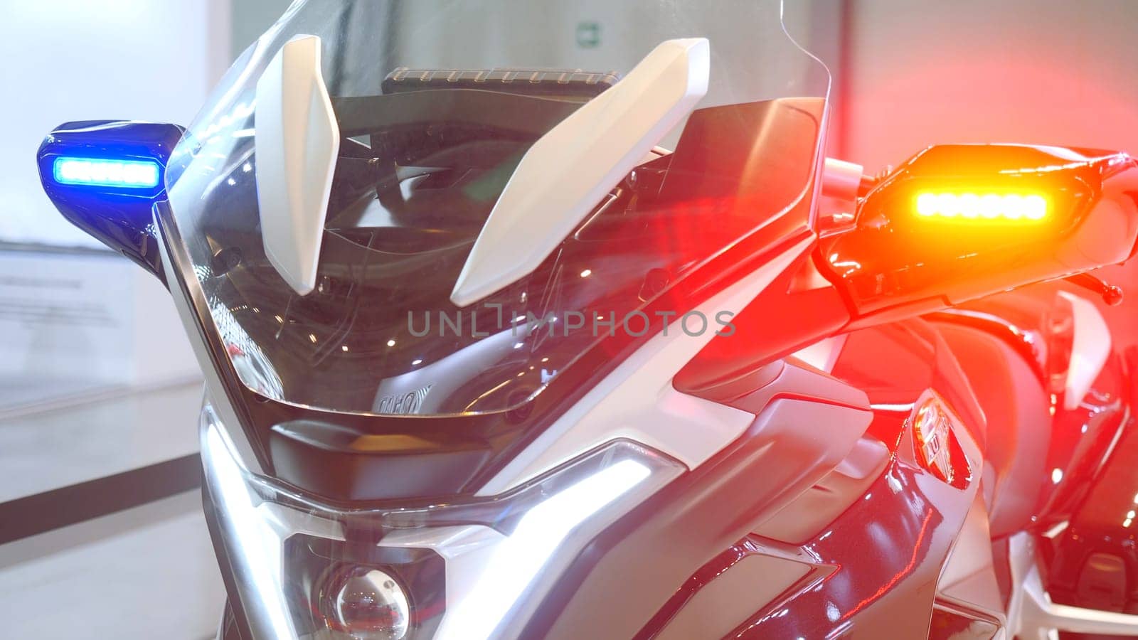 Police flashing lights on motorcycle. Media. New motorcycle model for police. New transport equipment with flashing lights for police.