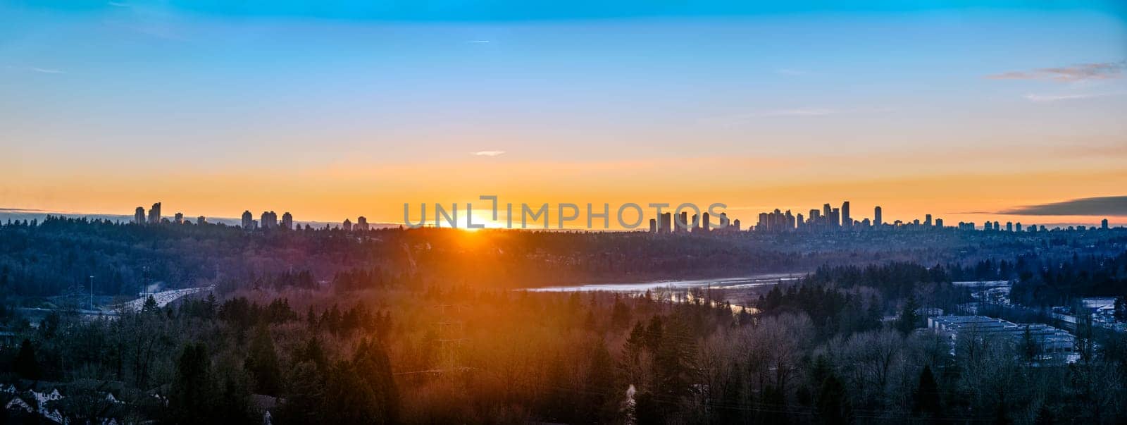 Panoramic view of urban sityscape on sunset hour.