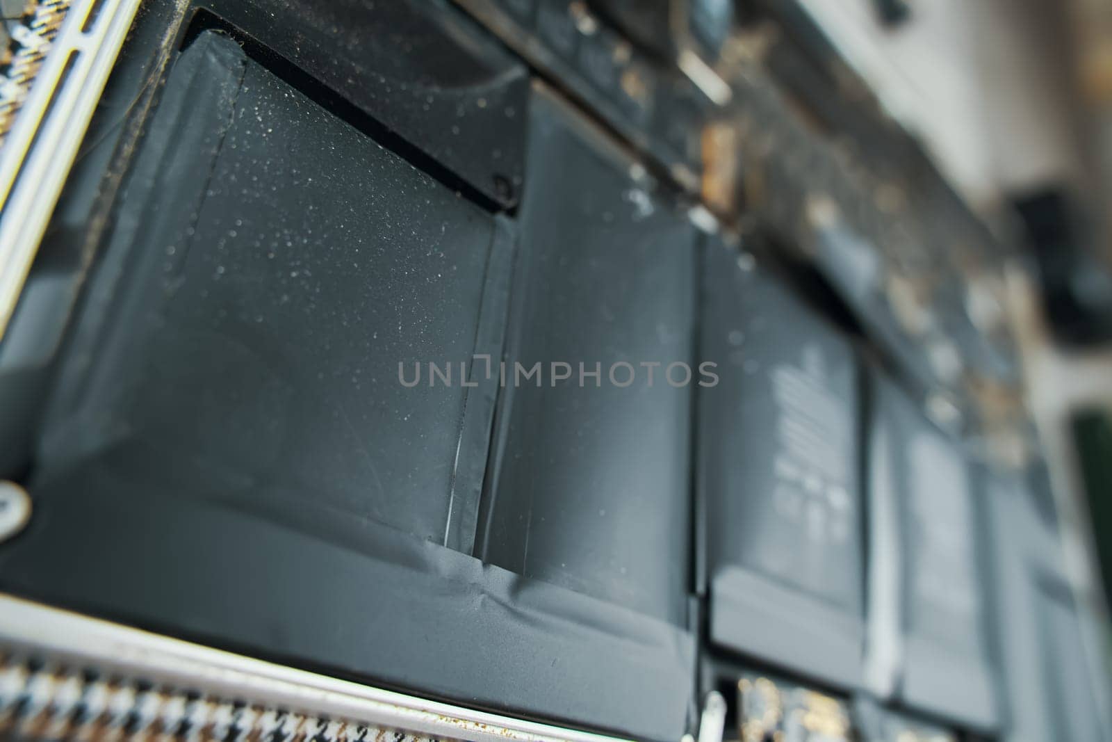 Detailed view of lithium-ion batteries inside an electronic device, showcasing technology and design.