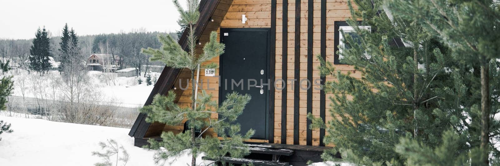 A country house in nature in winter. Rest in an ecologically clean place in winter. Glamping in nature