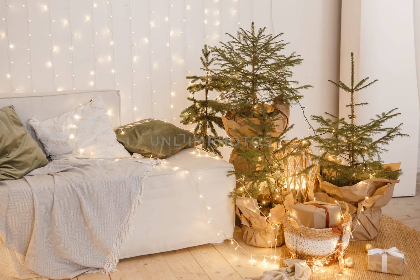 Interior bedrooms in Scandinavian style, decorated for the Christmas holidays. Live ate in the interior