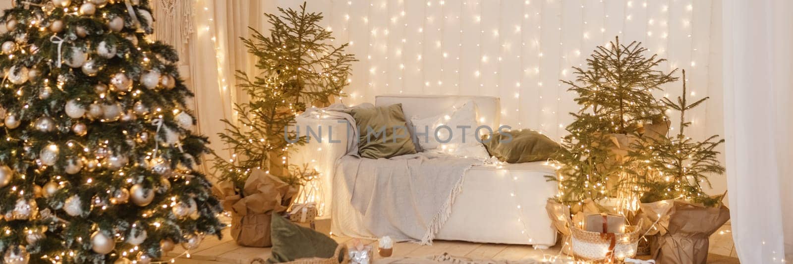 Interior bedrooms in Scandinavian style, decorated for the Christmas holidays. Live ate in the interior