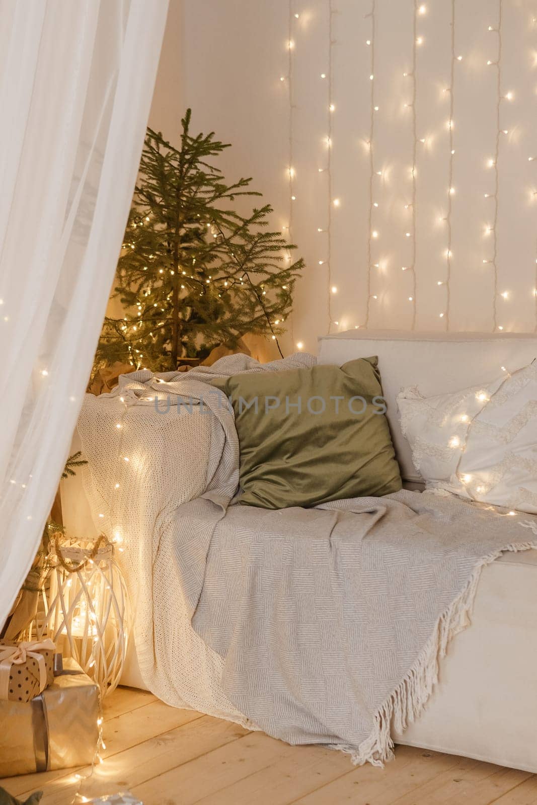 Interior bedrooms in Scandinavian style, decorated for the Christmas holidays. Live ate in the interior