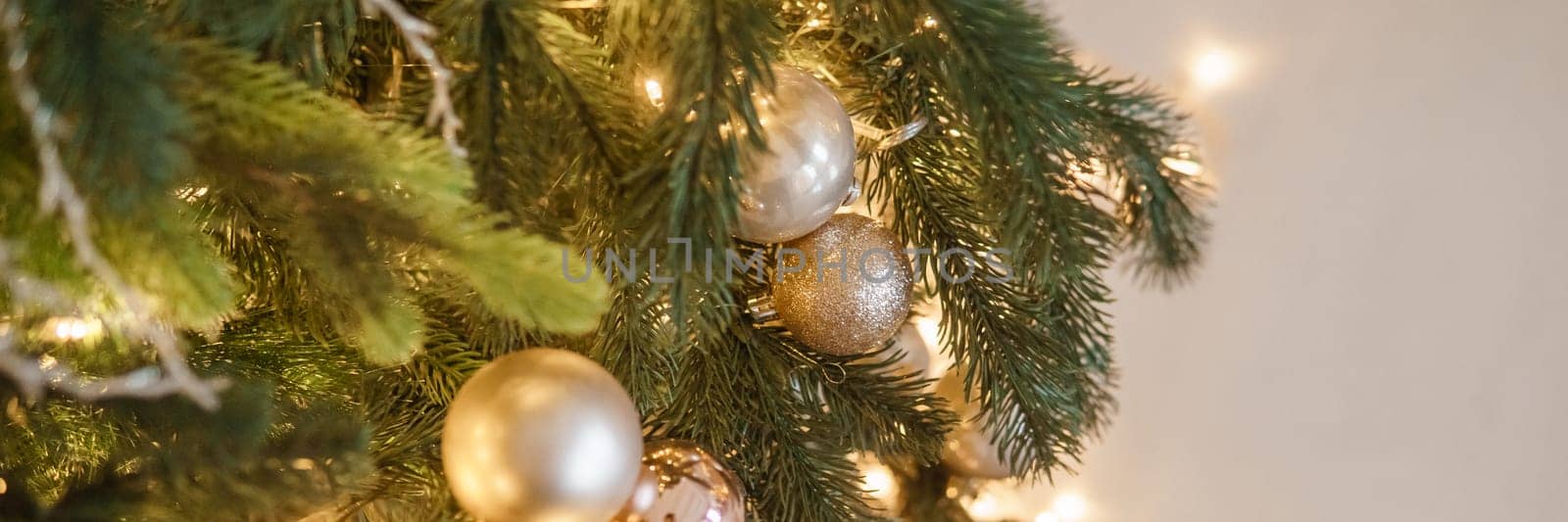 Christmas balls in close-up on the Christmas tree. Decorations for Christmas trees. The concept of celebrating New Year and Christmas