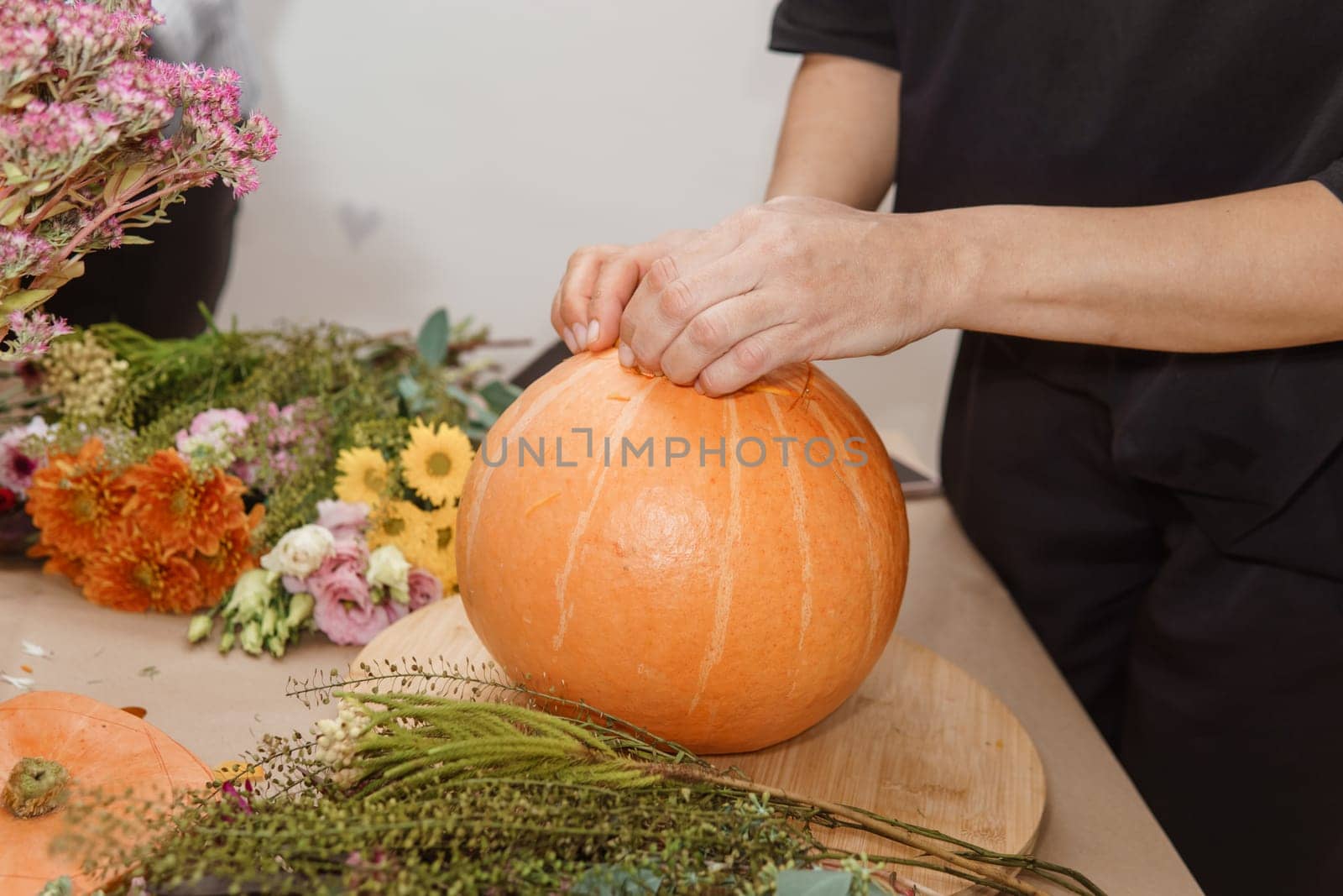 Creating a floral composition in a pumpkin. Making decor with your own hands