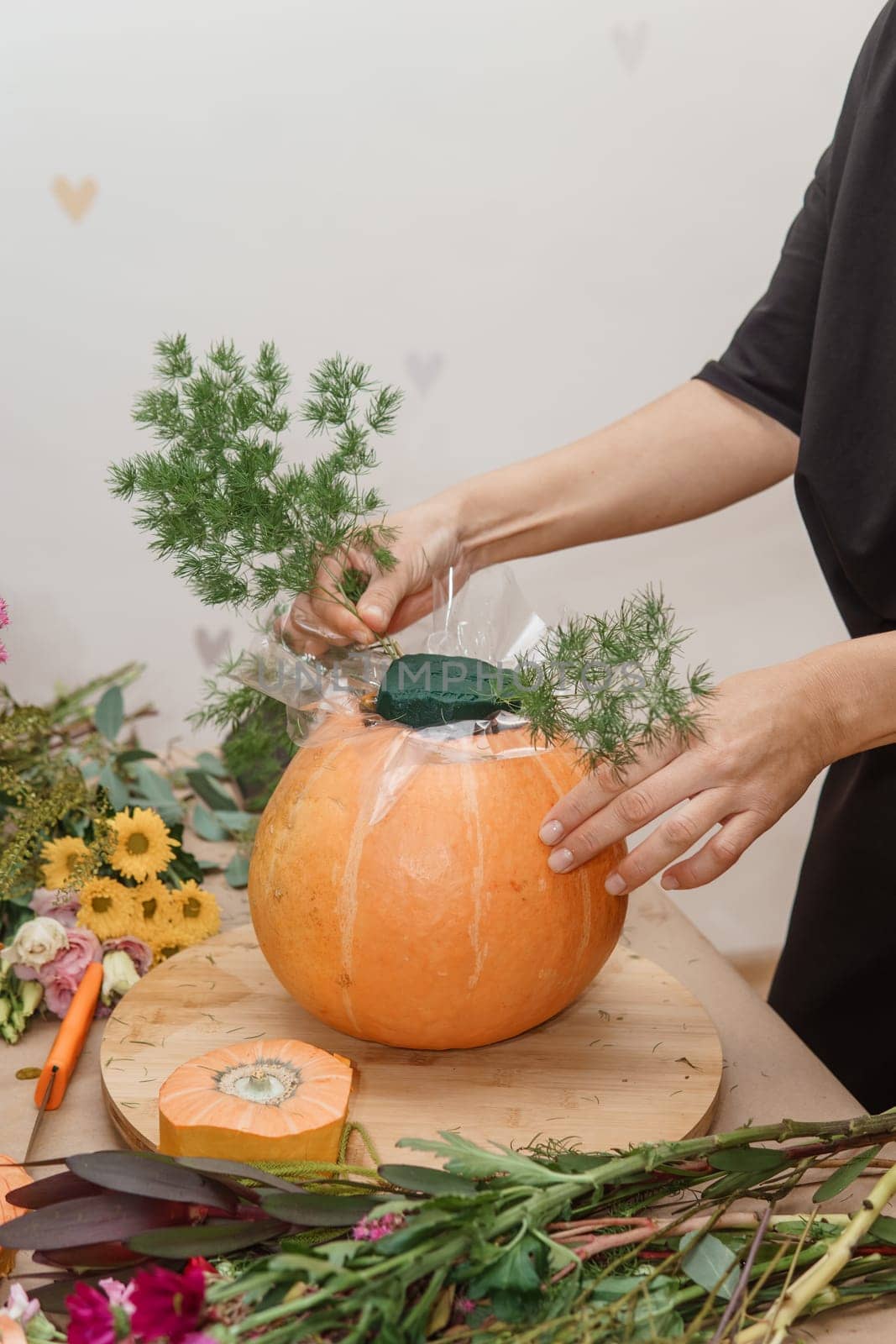Creating a floral composition in a pumpkin. Making decor with your own hands