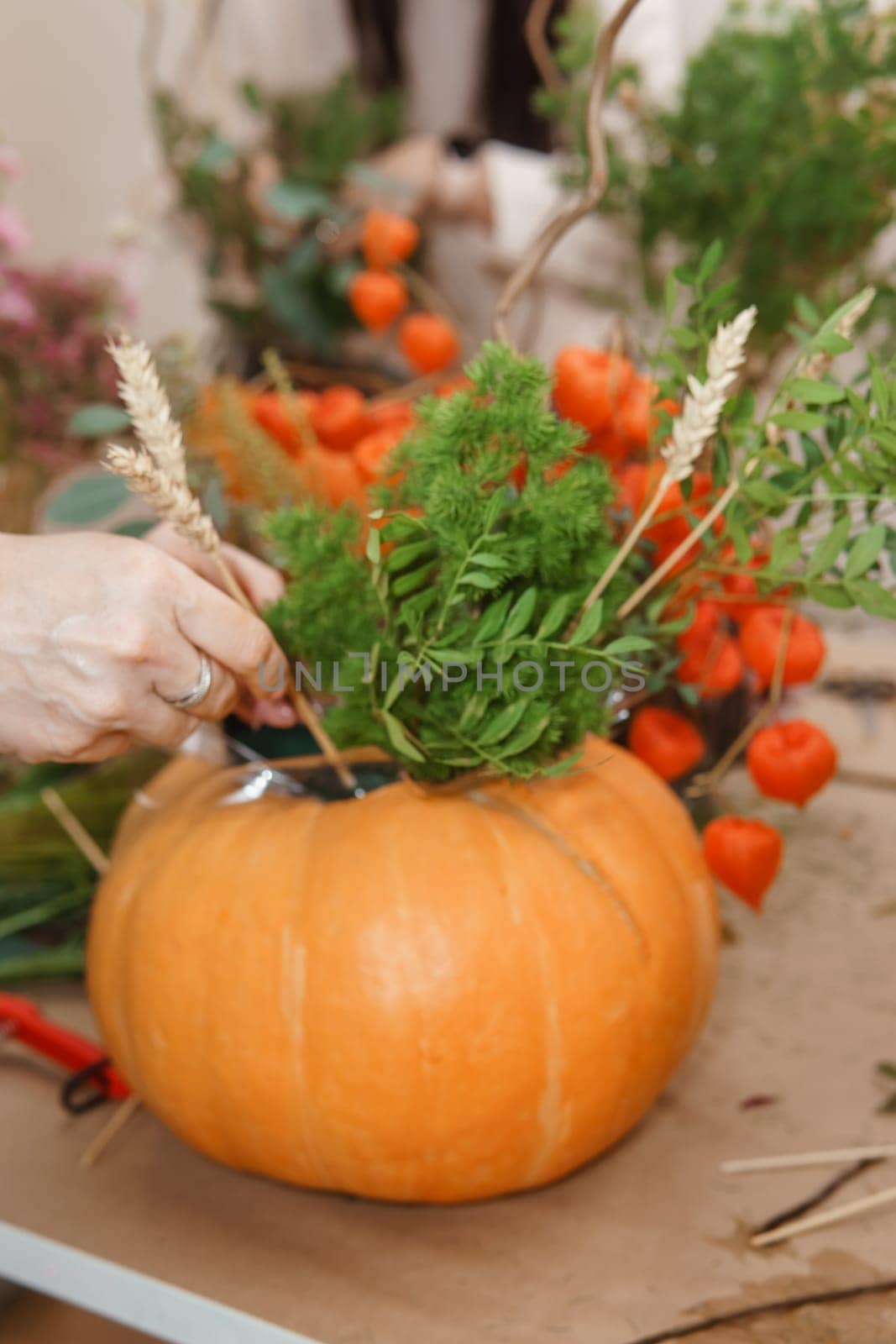 Creating a floral composition in a pumpkin. Making decor with your own hands