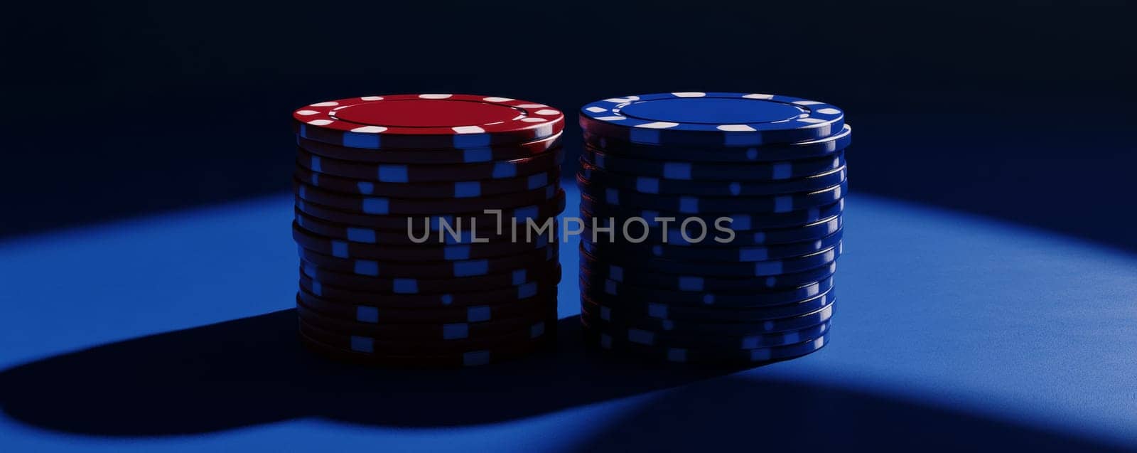 Stack of red and blue poker chips under spotlight, high contrast lighting. Gambling and casino concept.