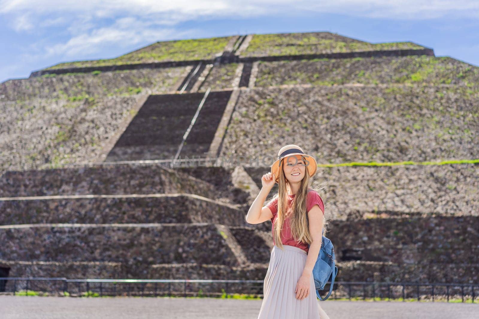 Female tourist exploring Teotihuacan, Mexico. Cultural heritage, ancient ruins, and archaeological adventure concept.
