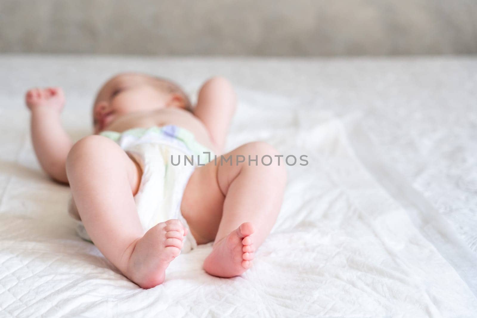 Focused imagery of baby's feet, representing the early phases of human development