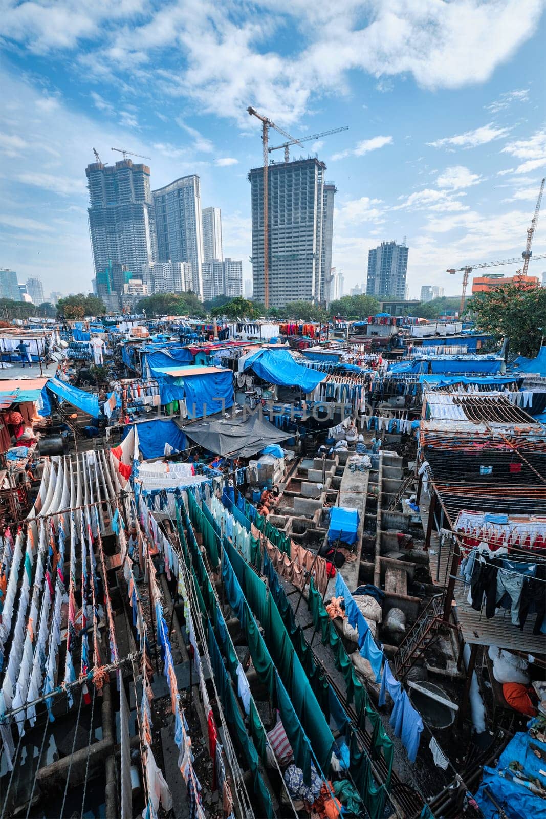 Dhobi Ghat Mahalaxmi Dhobi Ghat is an open air laundromat lavoir in Mumbai, India with laundry drying on ropes by dimol