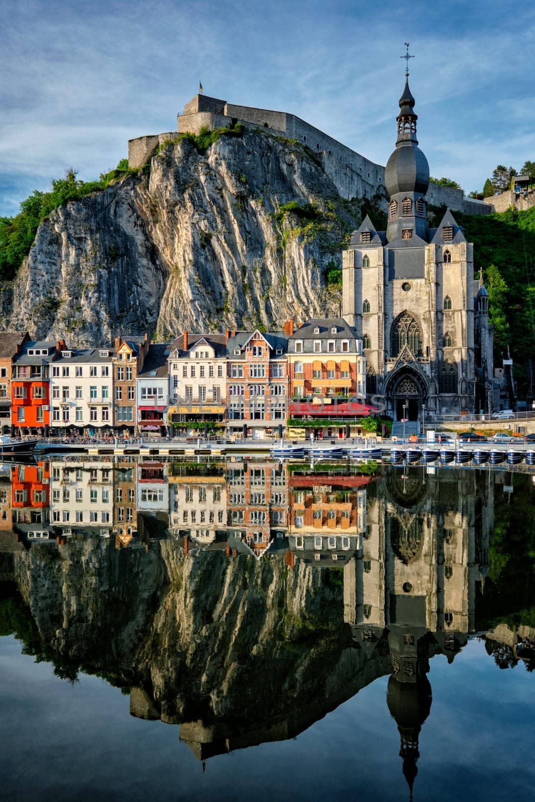 View of picturesque Dinant town, Dinant Citadel and Collegiate Church of Notre Dame de Dinant over the Meuse river. Belgian province of Namur, Blegium