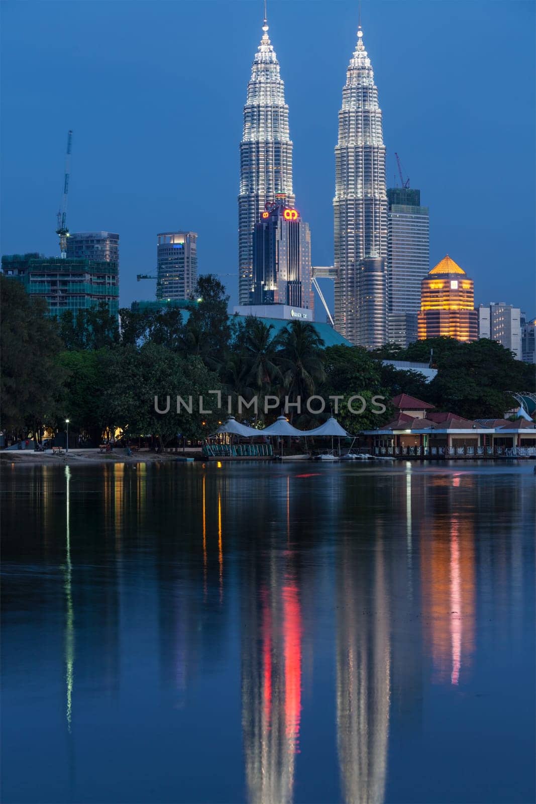 KUALA LUMPUR, MALAYSIA - JUNE 19: Petronas Twin Towers in twilight on June 19, 2011 in Kuala Lumpur. They were the tallest building in the world 1998-2004 and remain the tallest twin building