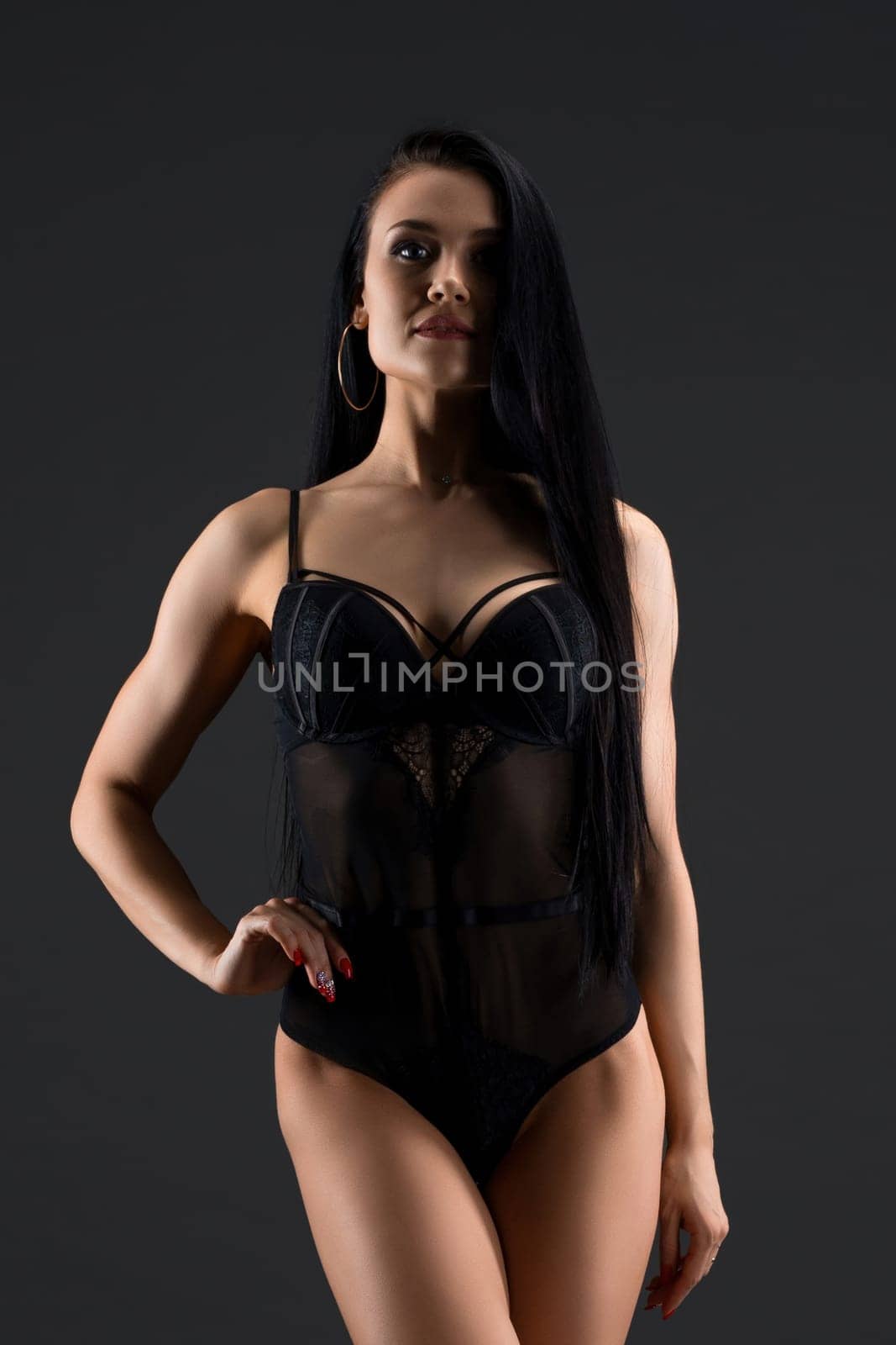 Gorgeous fitness model in sexy silk body full-length shot