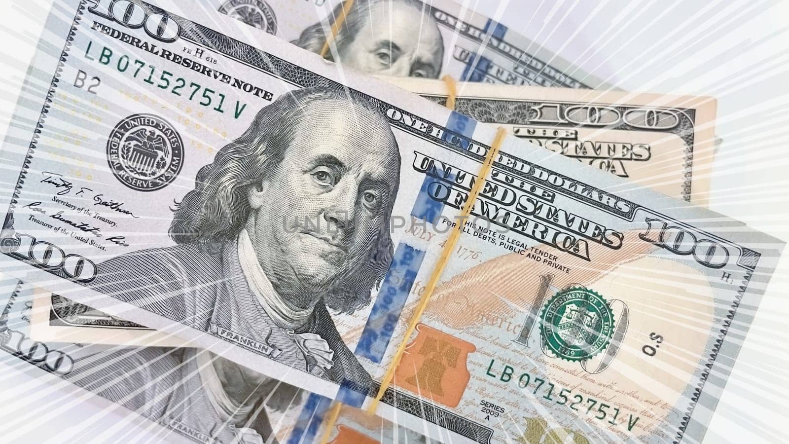 A Fan of $100 Bills.A close-up photo of a fan of $100 US dollar bills. The bills are arranged neatly, with the portrait of Benjamin Franklin visible on each bill. The background is white.Finance ve economy concept.
