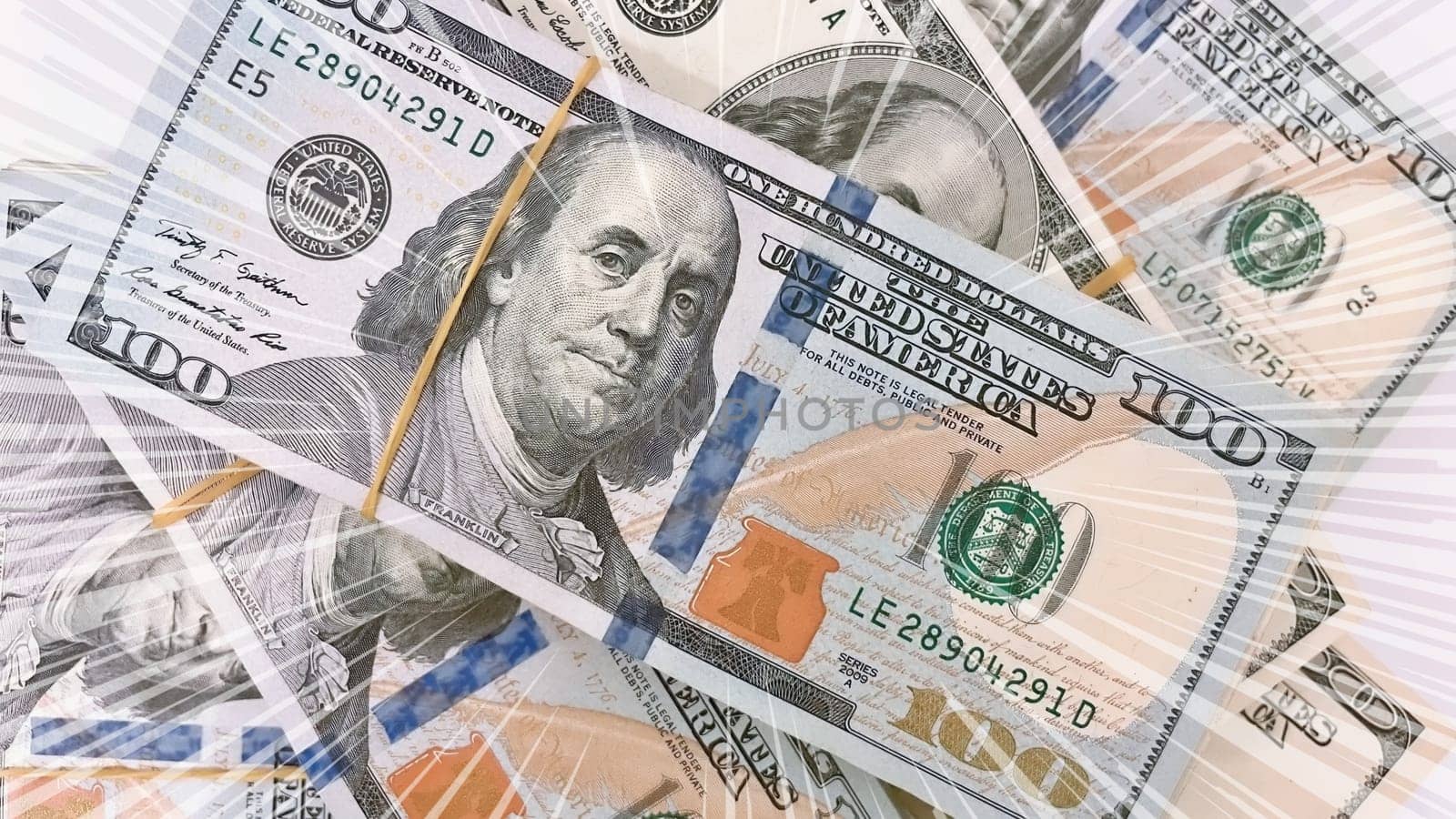 A Fan of $100 Bills.A close-up photo of a fan of $100 US dollar bills. The bills are arranged neatly, with the portrait of Benjamin Franklin visible on each bill. The background is white.Finance ve economy concept.