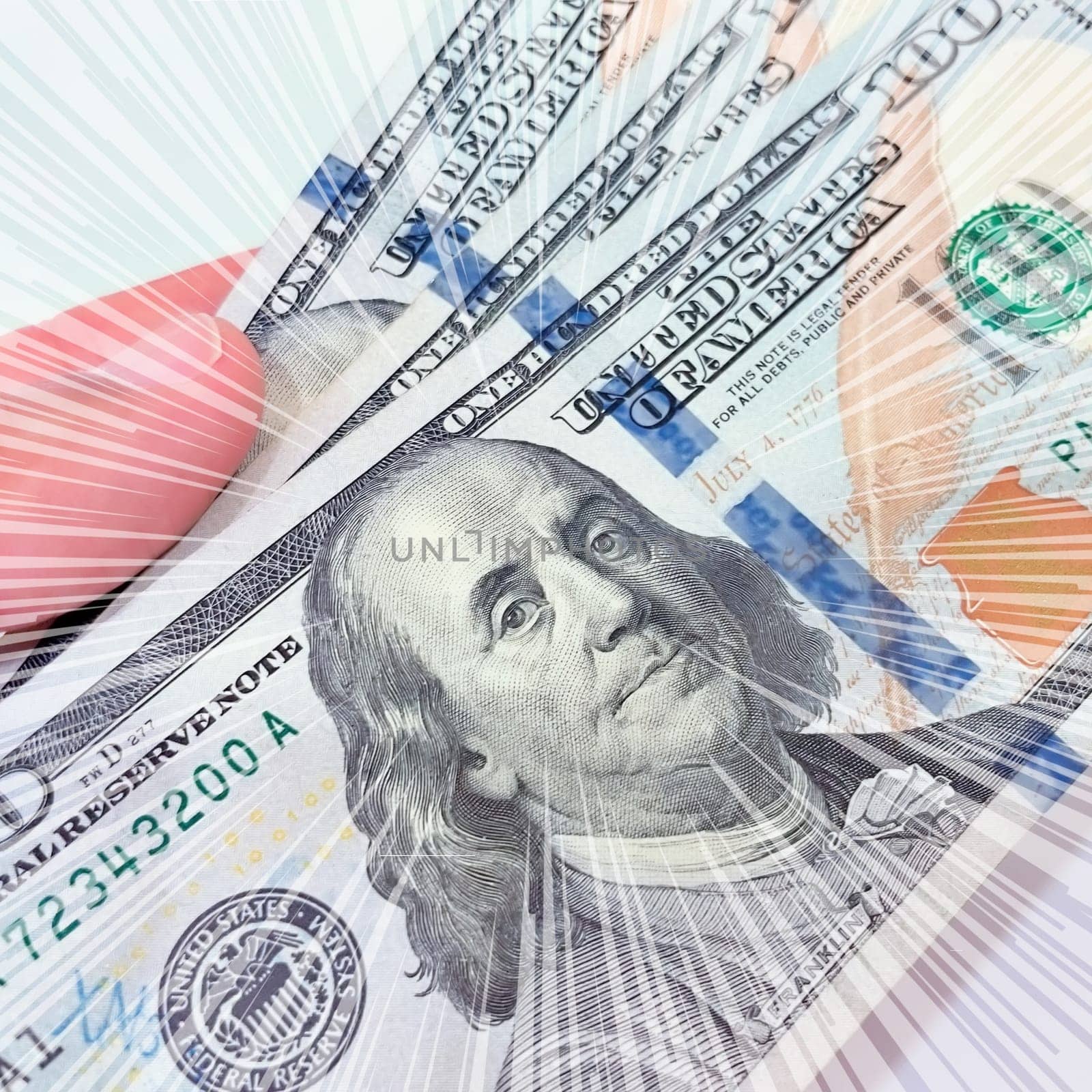 A Fan of $100 Bills.A close-up photo of a fan of $100 US dollar bills. The bills are arranged neatly, with the portrait of Benjamin Franklin visible on each bill. The background is white.Finance ve economy concept.