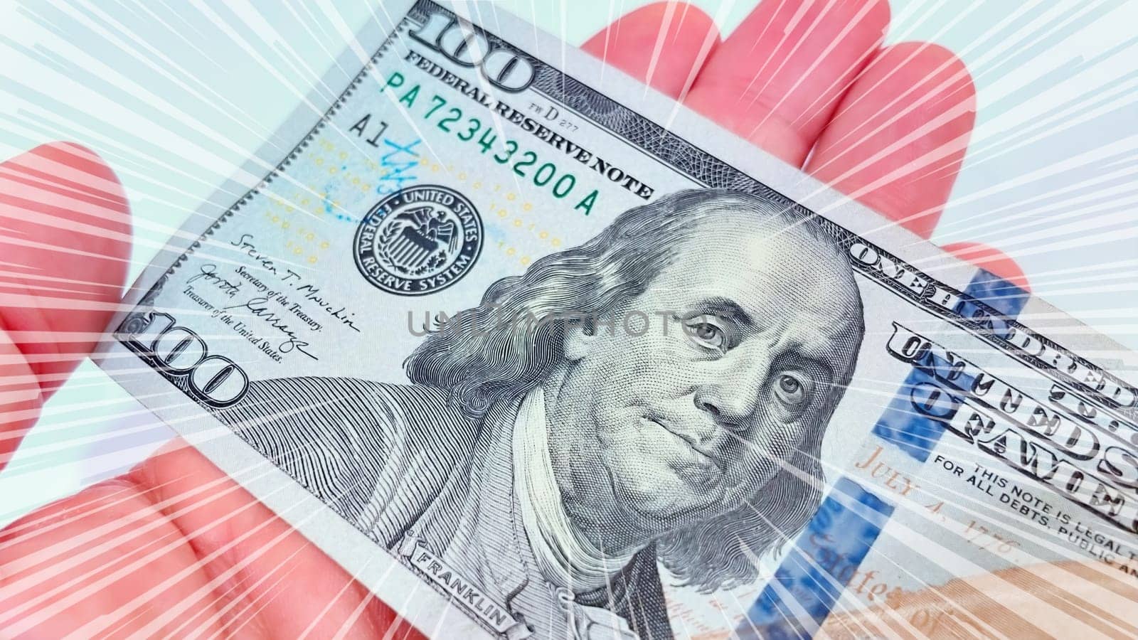 A Fan of $100 Bills.A close-up photo of a fan of $100 US dollar bills. The bills are arranged neatly, with the portrait of Benjamin Franklin visible on each bill. The background is white.Finance ve economy concept.