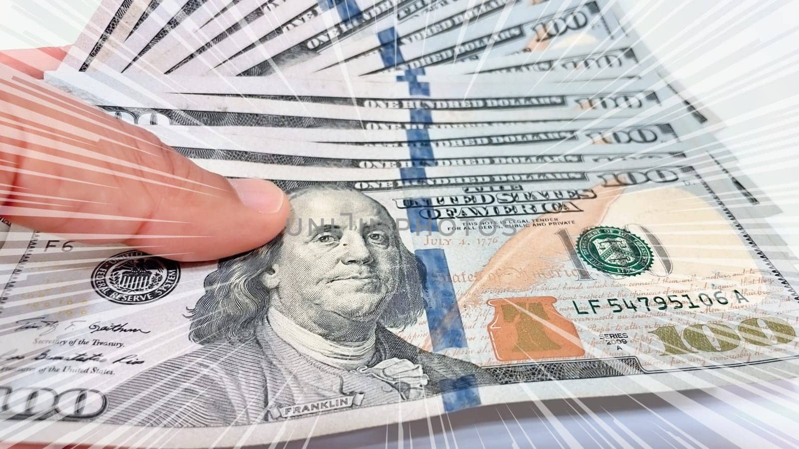 A Fan of $100 Bills.A close-up photo of a fan of $100 US dollar bills. The bills are arranged neatly, with the portrait of Benjamin Franklin visible on each bill. The background is white.Finance ve economy concept.