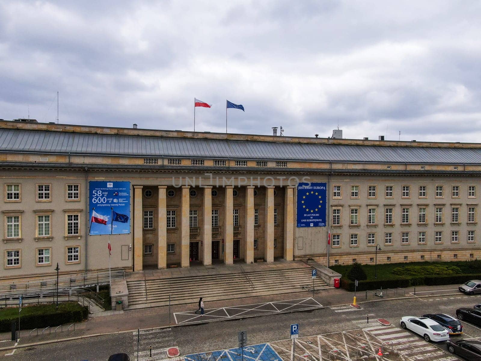 View of the provincial office building with Polish and European Union flags on the roof
