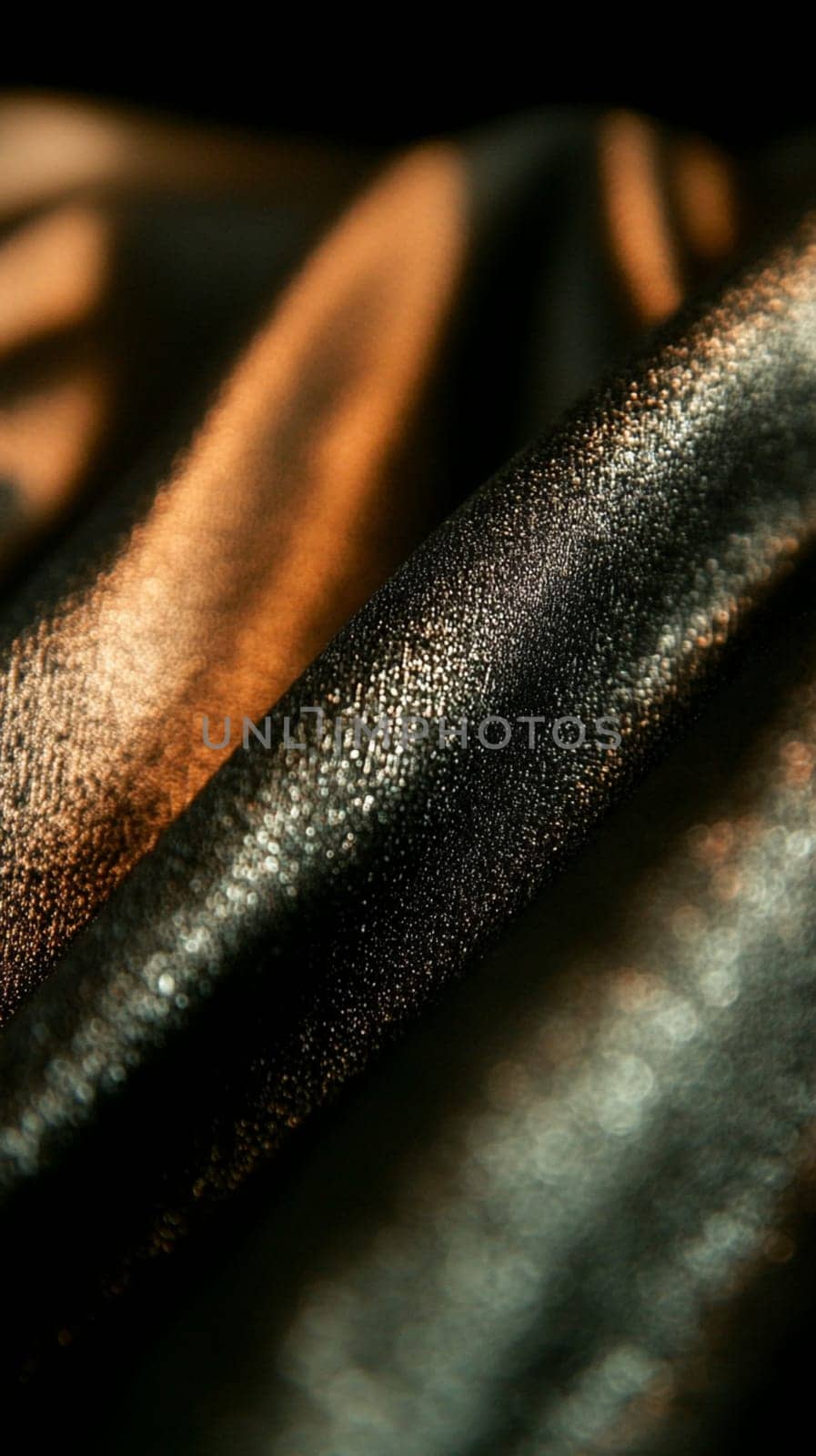 Flowing blue silk fabric shimmers elegantly, creating a luxurious texture perfect for fashion or crafting projects
