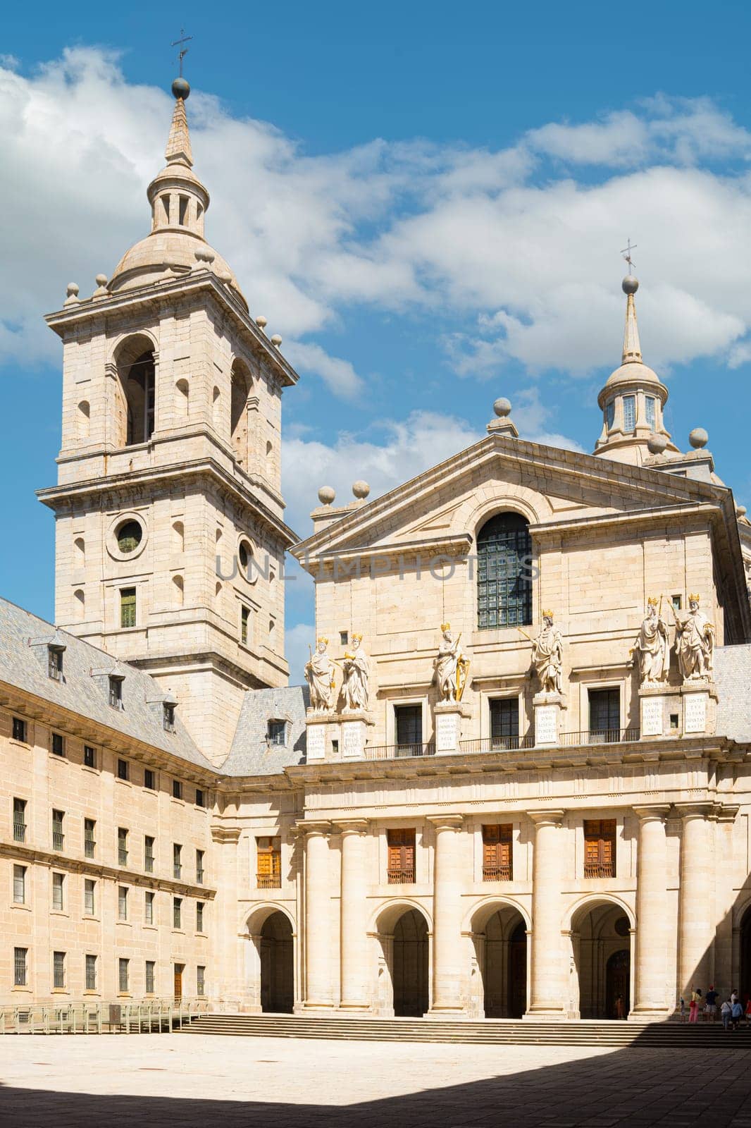 Facade of the Basilica of the Royal Monastery of San Lorenzo del Escorial. Community of Madrid, Spain. Vertical photo