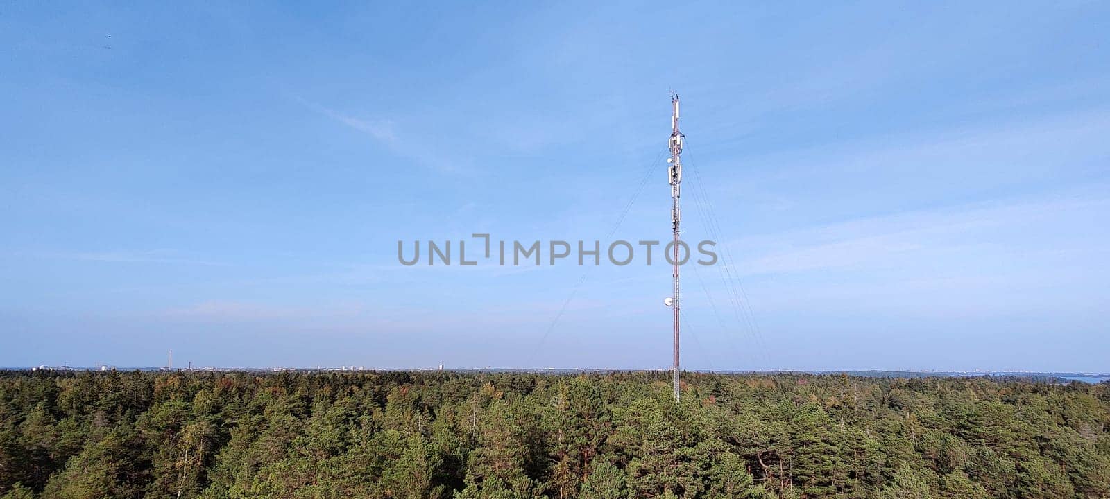 Espoo, Finland, September 24th, 2024 - mobile phone tower in pine Finnish forest