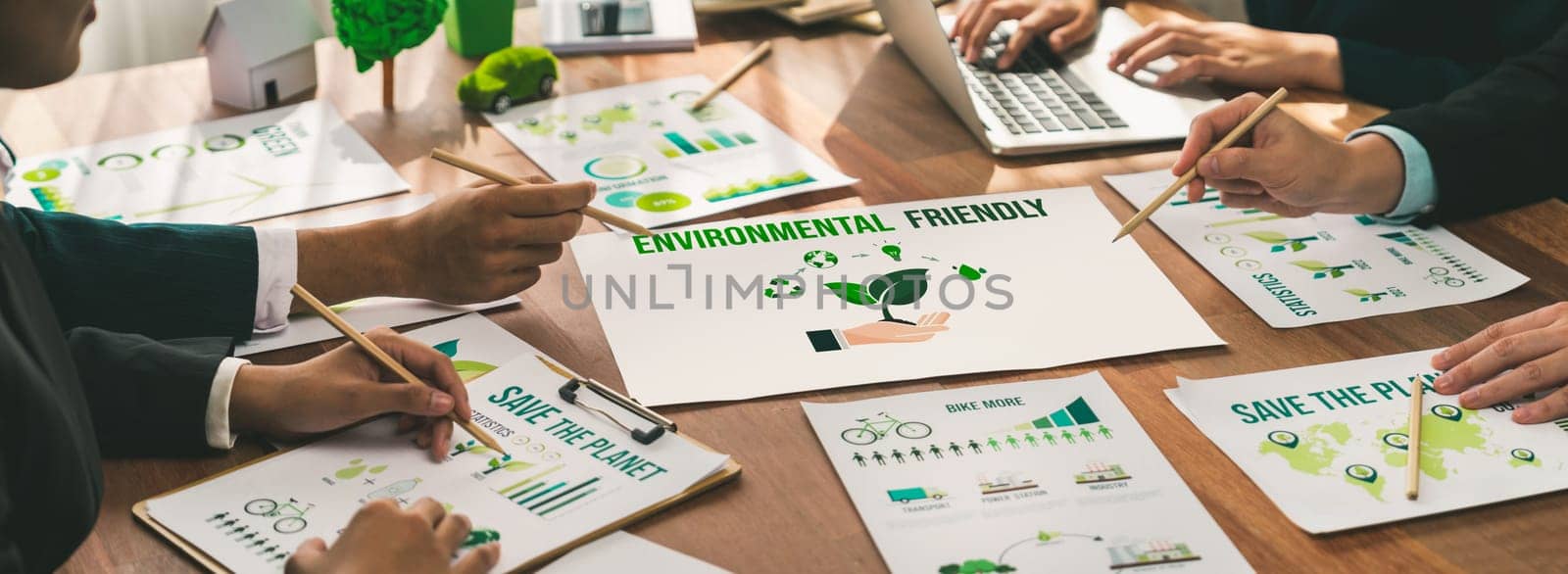 Eco business company meeting with group of business people planning strategy and discuss marketing of eco-friendly and renewable clean energy products. Green business company concept. Trailblazing